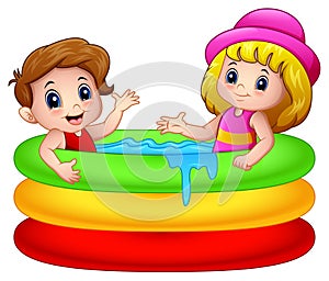 Cartoon boy and girl playing in an inflatable pool