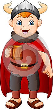 Cartoon boy in viking costume holding a beer mug