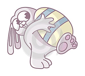 Cartoon bunny carries a golden easter egg. colorful design of an easter bunny white background.