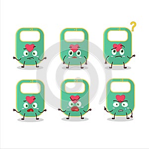 Cartoon character of green baby appron with what expression