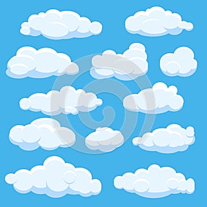 Cartoon vector clouds on blue sky