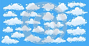 Cartoon clouds. Cute simple summer clouds on blue sky, flat white game elements. Vector set