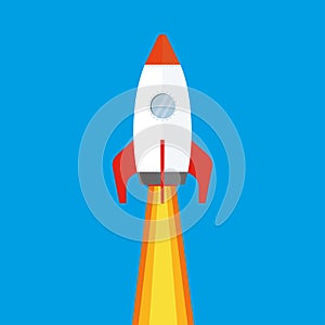 Cartoon Colored soaring spaceship on blue background,flat Rocket