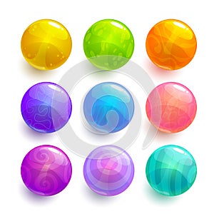 Cartoon colorful glossy balls set. Shiny decorative bubbles for GUI design. photo
