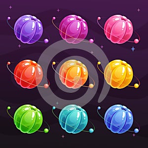 Cartoon colorful jelly planets on space background. Glossy sweet round items for game design.