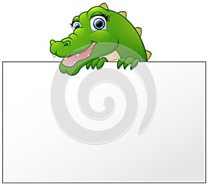 Cartoon Crocodile holding and looking over a blank sign board