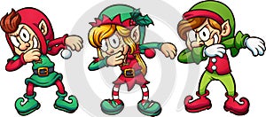 Cartoon dabbing Christmas elves photo