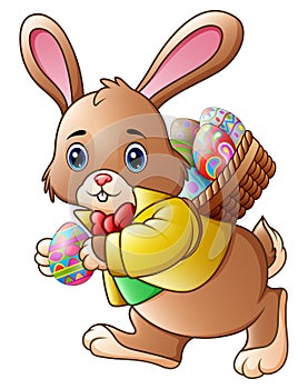 Cartoon Easter bunny carrying a basket full of eggs