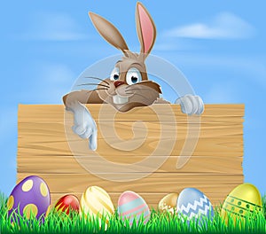 Cartoon Easter bunny pointing