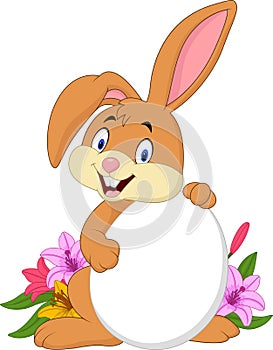 Cartoon Easter rabbit holding white egg