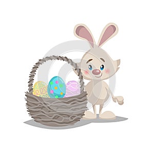 Cartoon funny easter bunny with big basket and painted colorful eggs. Spring character mascot and seasonal vector illustration.