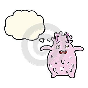 cartoon funny slime monster with thought bubble