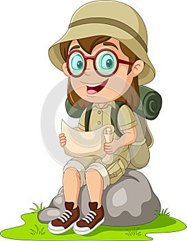 Cartoon girl scout on rock reading a map