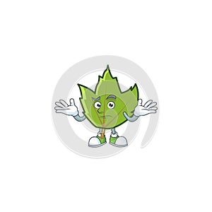 Cartoon green autumn leaves design mascot grinning.
