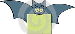 Cartoon happy vampire bat holding a sign in it`s mouth.