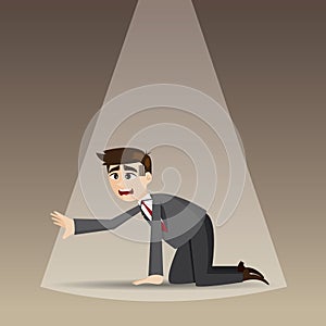 Cartoon hopeless businessman kneel on floor photo