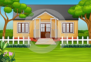Cartoon house with green yard and wooden fence