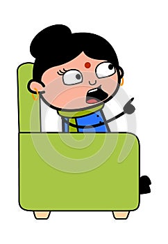 Cartoon Indian Lady sitting on sofa