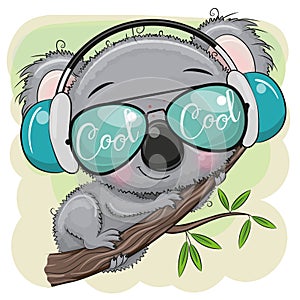 Cartoon Koala is sitting on a tree photo