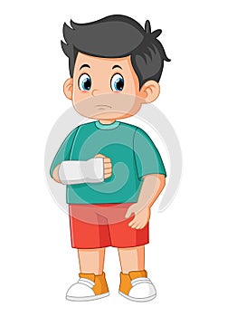 Cartoon little boy with broken arm