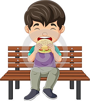 Cartoon little boy eating hamburger on bench