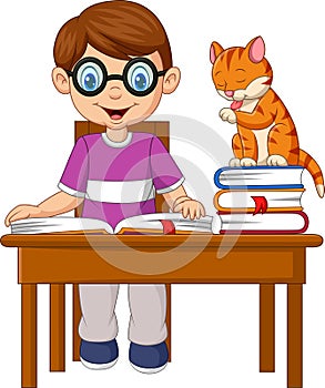 Cartoon little boy studying with a cat