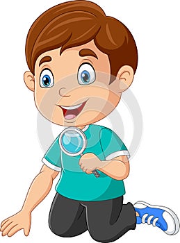 Cartoon little boy using a magnifying glass