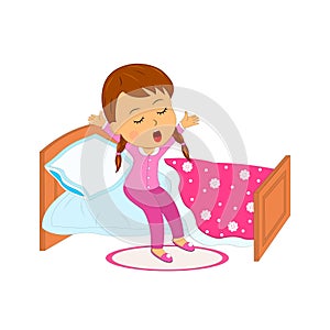 Cartoon little girl waking up in the morning photo