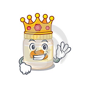 A cartoon mascot design of almond butter performed as a King on the stage