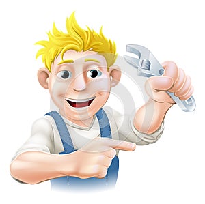 Cartoon plumber or mechanic pointing photo