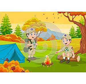 Cartoon scout with tent and camp fire