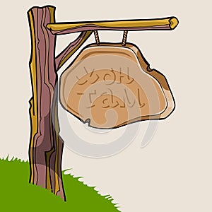 Cartoon signboard on a log of wood