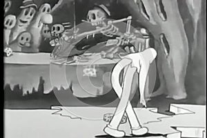Cartoon of a skeleton circling a break dancing ghost
