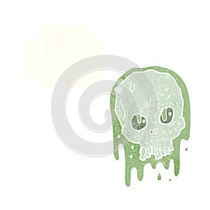 cartoon slimy skull with thought bubble