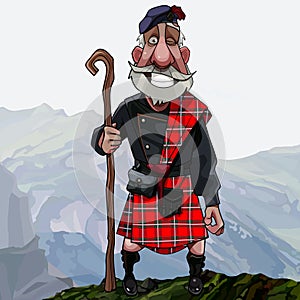 Cartoon smiling gray haired Scottish highlander in a kilt with a staff in his hand stands high in the mountains