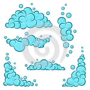 Cartoon soap foam set with bubbles. Light blue suds of bath, shampoo, shaving, mousse. Vector illustration photo