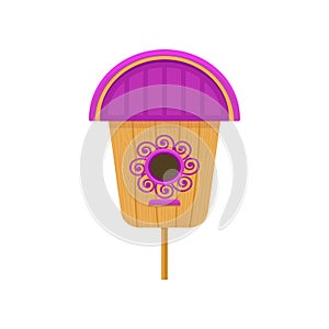 Flat vector icon of wooden birdhouse with purple roof and pattern. Nesting box on stand. Small house for birds