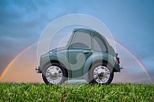 A cartoon style vehicle on a lush lawn.