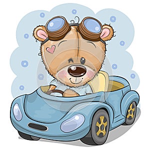 Cartoon Teddy Bear in glasses goes on a Blue car photo