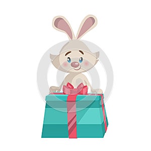 Cartoon trendy style cute bunny mascot with big green gift box icon. Simple gradient