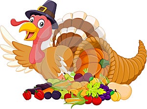 Cartoon turkey with horn of plenty isolated on white background photo