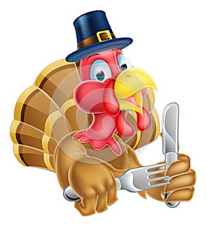 Cartoon Turkey in Thanksgiving Pilgrims Hat Holding Knife and Fo photo