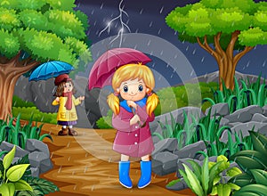 Cartoon two girl carrying umbrella under the rain in the forest