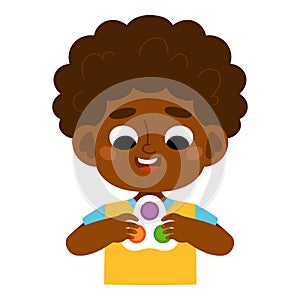 Cartoon vector illustration, African boy holds an antistress simple dimple toy in hands