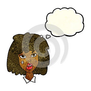 cartoon woman with bruised face with thought bubble