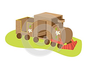 Cartoon wooden toy train with colorful details on green. Children's playtime toy locomotive vector illustration