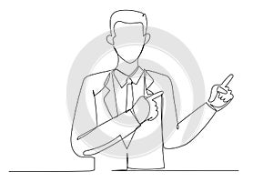Cartoon of young businessman pointing to side and upwards with both hands showing object in copy space.