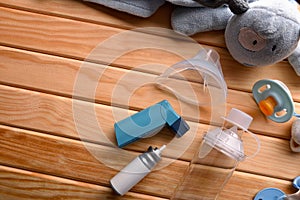 Cartridge inhaler and chamber and mask parts pediatric on wood