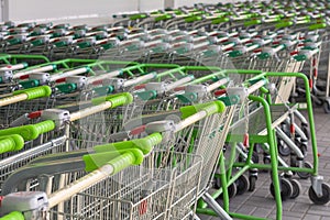 Carts for shopping at the supermarket. Parking shopping trolleys.