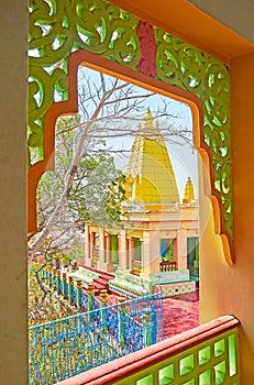 Through the carved arch, Sagaing, Myanmar